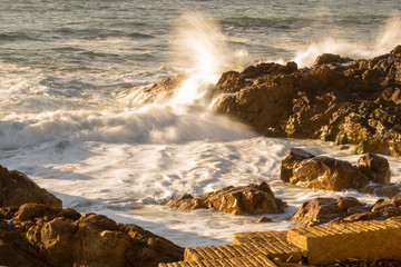 Wave hitting the rocks