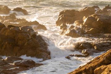 Wave hitting the rocks