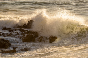 Wave hitting the rocks