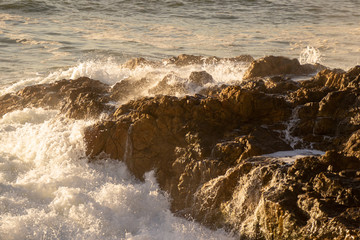 Wave hitting the rocks