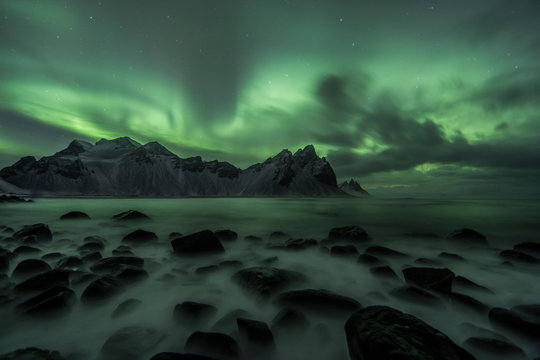 Aurora Borealis (Northern Lights) above Stokksnes Beach and Vestrahorn Mountains, Iceland
