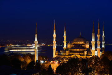 Fototapeta na wymiar Cruise ship passing the Blue Mosque at twilight on the Bosphorus Sultanahmet Istanbul Turkey