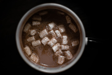 cup of coffee on black background