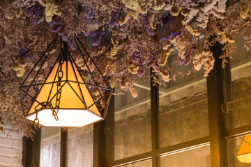 lamp and dried flower ceiling, room decoration. 