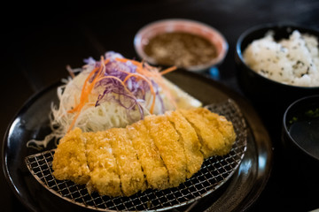 Tonkatsu, Breaded pork cutlet,  Japanese food, dark background 