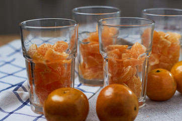The prepared tangerine in a drinking glass