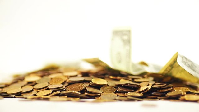 White-gloved hands scooping up a pile of gold coins. They sort out and scatter money.On white background. Garland. Money glitters.