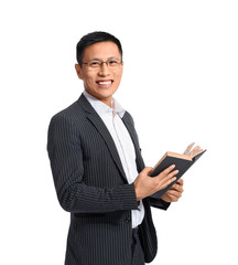 Handsome Asian businessman with book on white background