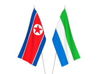 National fabric flags of Sierra Leone and North Korea isolated on white background. 3d rendering illustration.
