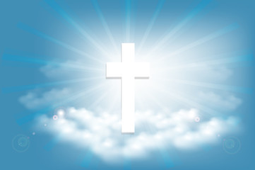 Cross and clouds on the brightest day in the sky.