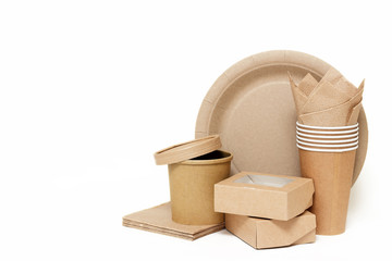 Eco kraft paper tableware. Paper cups, dishes, fast food containers, paper napkins isolated on white background. Recycling concept. Zero waste.