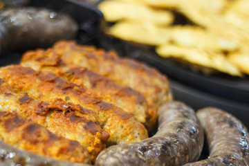 Grilled homemade sausage with spices. Traditional polish food