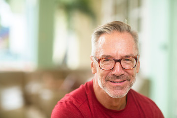 Mature handome fit man sitting outside stock photo