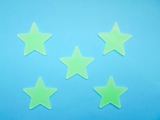 blue background with yellow-green stars, free space for your text