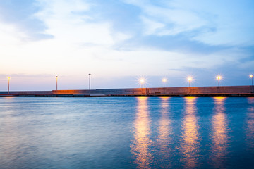 pier and lights in sunset