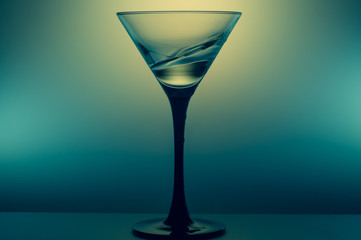 Martini glass with water splash. transparent cocktail