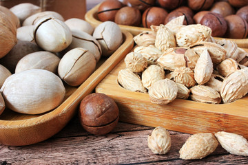 Nuts on a wooden plate
