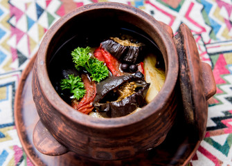 Potatoes with meat and vegetables in clay pot. Georgian national cuisine. Restaurant.