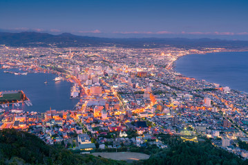 Night life of Hakodate city observation view point from mountain, Japan cityscape background