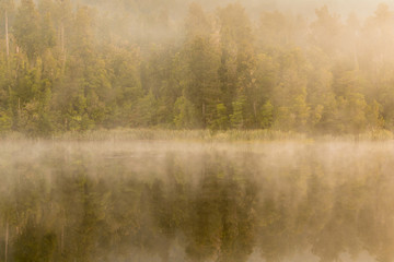 Fototapeta na wymiar Matheson lake reflection during morning, New Zealand natural landscape background