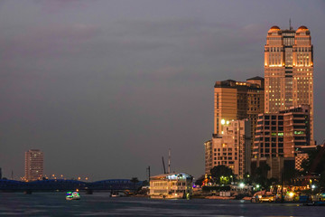 Cairo, Egypt, Skyline at sunset and the Nile river.