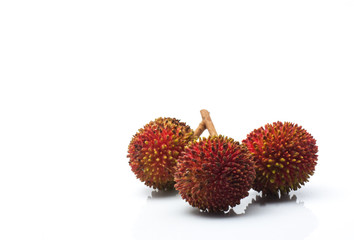 Pulasan or wild rambutan on isolated background