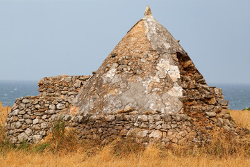 traditional old trulli houses in Apulia Italy