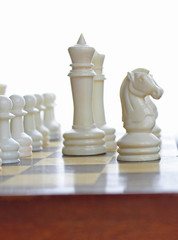 Chess board gold pawn moving. Business concept.