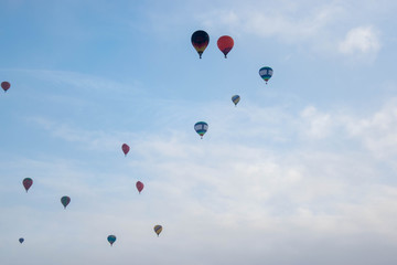 The hot  air baloons fest in Russia. Apples on the snow. Colorfull balloons in the winter skye
