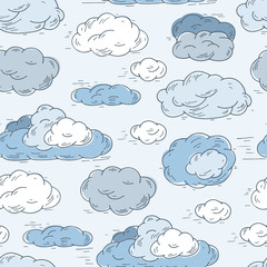 Sky. Blue clouds. Clouds Vector Seamless pattern. Hand Drawn Doodle Clouds.