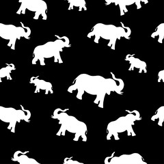 Fototapeta premium Seamless pattern with the silhouette of an African elephant. Vector hand-drawn illustration isolated on white background.