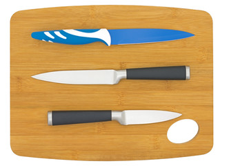 knifes on kitchen board on white