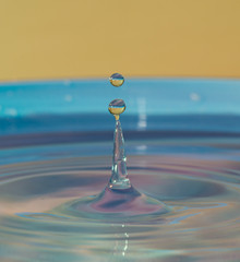 water drop macro on the water surface