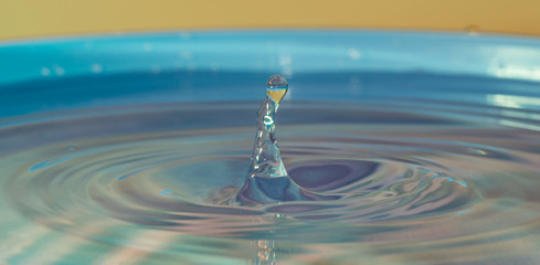 water drop macro on the water surface