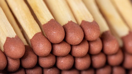 Wooden matches in a box close up. Fire.