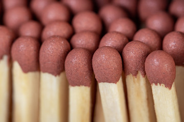 Wooden matches in a box close up. Fire.