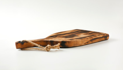 Rustic paddle shaped cutting board