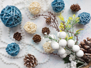 Creative designer balls and christmas tree on a white background. Flat lay.