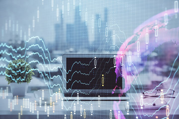 Forex graph hologram on table with computer background. Multi exposure. Concept of financial markets.