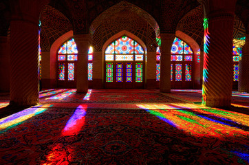 Isalamic interior of ornamental of Nasir Al-Molk Mosque with colorful shining stained glass windows...