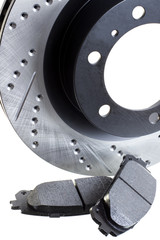 brake discs and pads on a white background