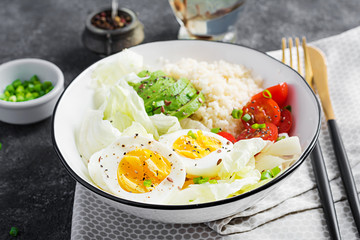 Couscous, egg and vegetables bowl. Healthy, diet, vegetarian food concept.  Vegetarian buddha bowl.
