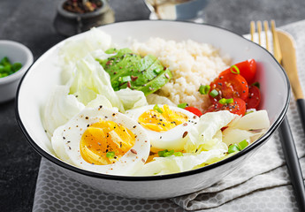 Couscous, egg and vegetables bowl. Healthy, diet, vegetarian food concept.  Vegetarian buddha bowl.