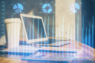 Obraz na płótnie Canvas Double exposure of forex graph and work space with computer. Concept of international online trading.