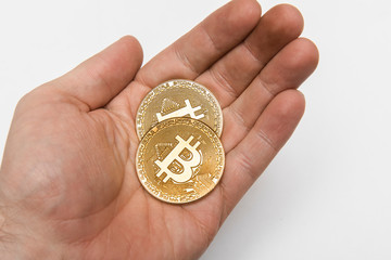 Bitcoins in a hand