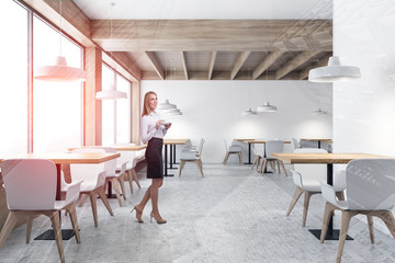 Woman in loft white coffee shop