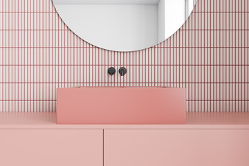 Pink bathroom interior with sink and mirror