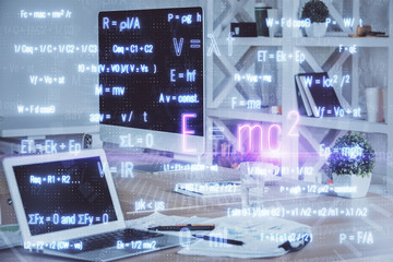 Desktop computer background and formula hologram writing. Double exposure. Education concept.