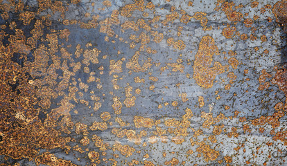 The texture is metallic. Industrial background from an old rusty metal. Textured metal background with rust and cracks.