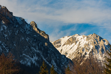 Obraz premium Peaceful mountain view of Hochschwab mountains Tragos, Oberort in Austria Styria. Tourist destination lake Gruner See in winter.